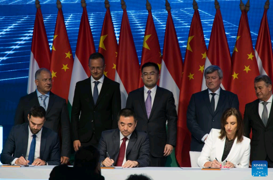 Representatives sign an agreement during the CATL factory investment announcement ceremony in Debrecen, Hungary, on Sept. 5, 2022. 