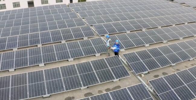 Disctributed solar energy system installed on the rooftop of a factory in China.